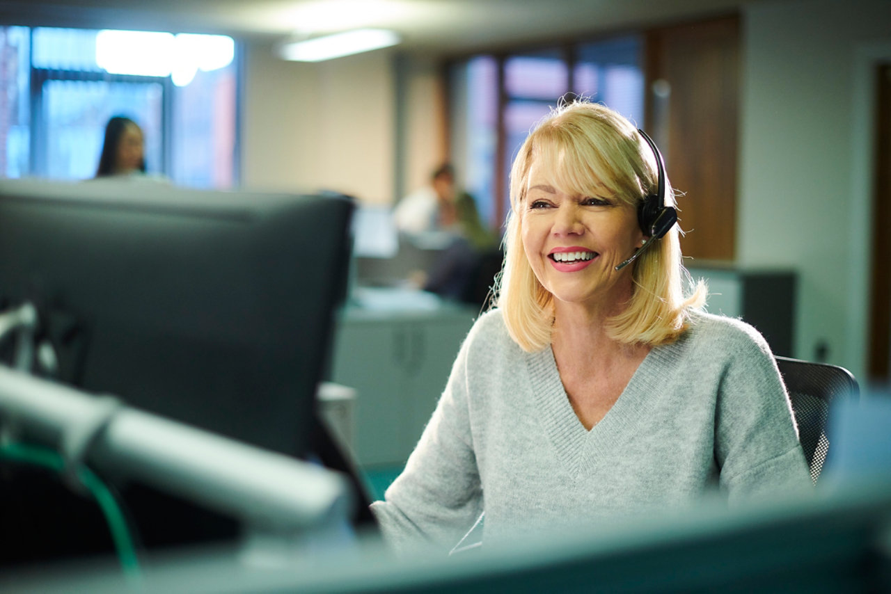 Woman with headset working in customer-service