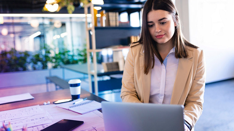 woman working on her laptop