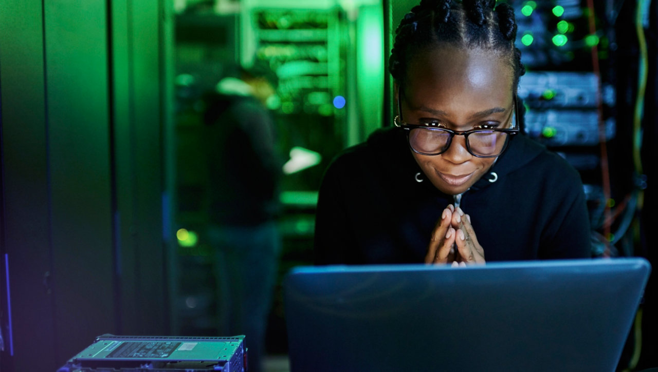 person checking out their network security on a laptop