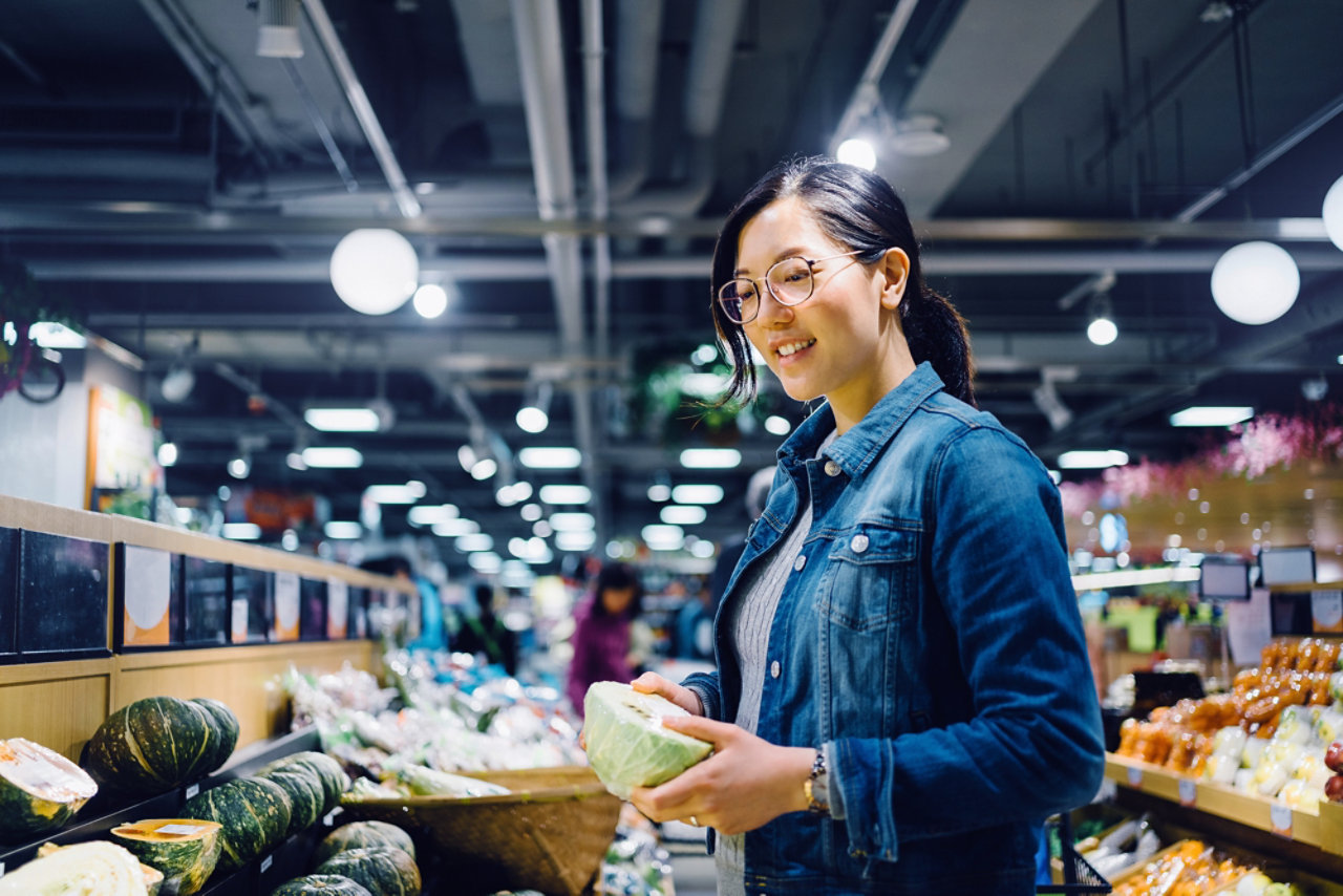 young lady supermarket shopping